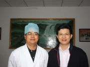 李院长在本门诊与惠州市卫生局副局长合影留念
